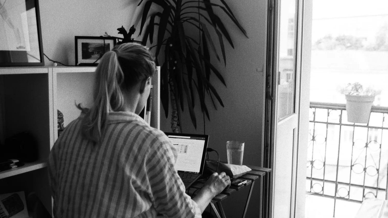 A team working together around a shared desk.
