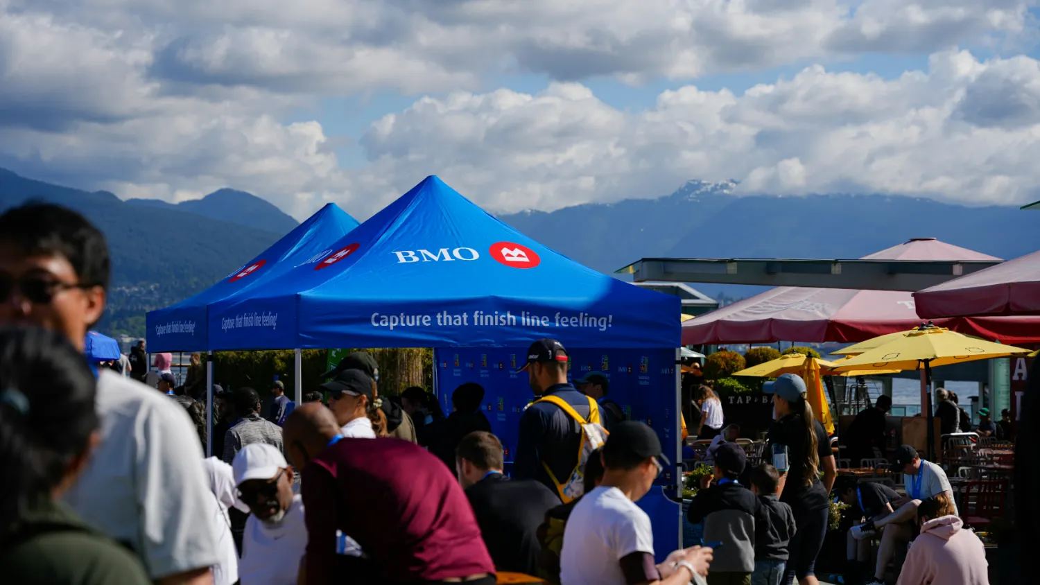 A brand activation team engaging visitors at a public event.