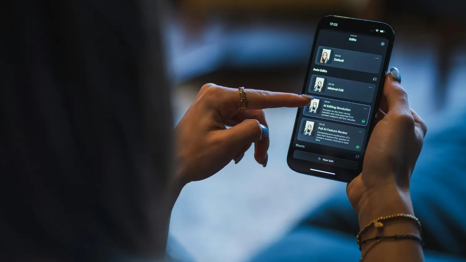 Two people looking together at a list on a phone screen.